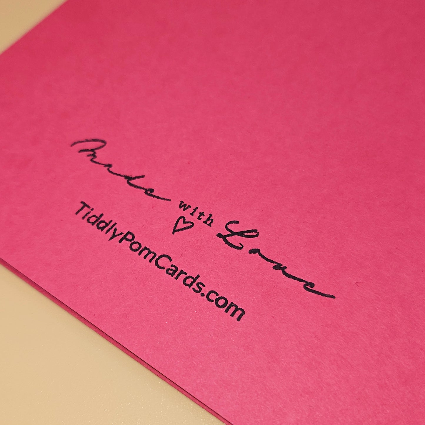 Pink card with 'Made with Love' and TiddlyPomCards.com text on a pink and beige background