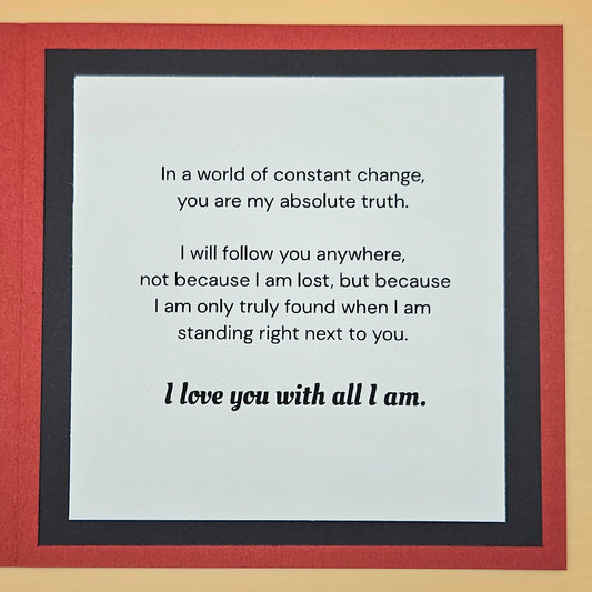 Framed romantic quote on a light gray background with a red border.