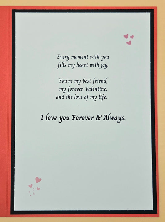 Card with romantic message and hearts on a beige background