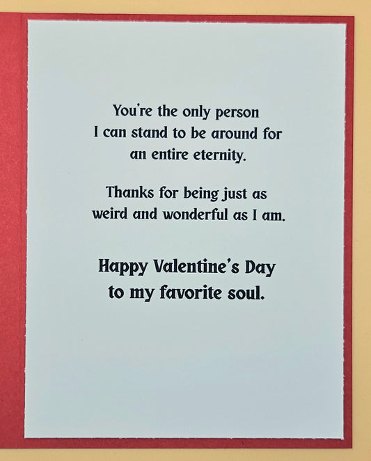 Valentine's Day card with romantic message on a light blue background