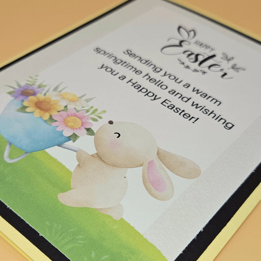 Easter card with a bunny and flowers on a yellow background