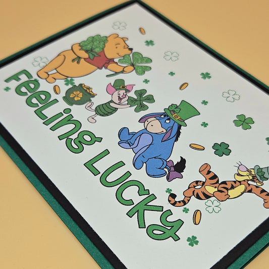 Placemat with cartoon characters and 'Feeling Lucky' text on a beige background