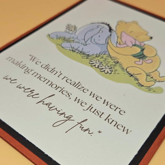 Illustration of a bear and a rabbit with a quote on a card