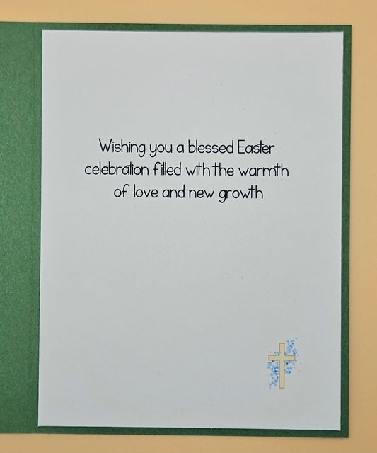 Easter card with cross design and text on a green border