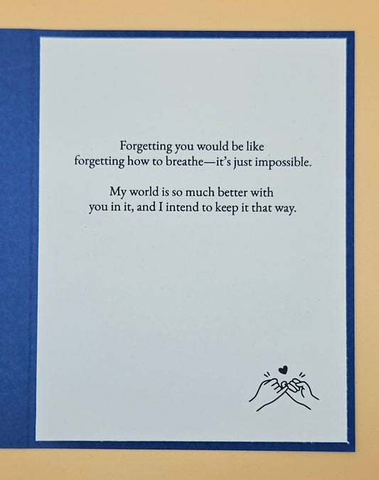 Card with a heartfelt message about missing someone, framed by blue and beige borders.