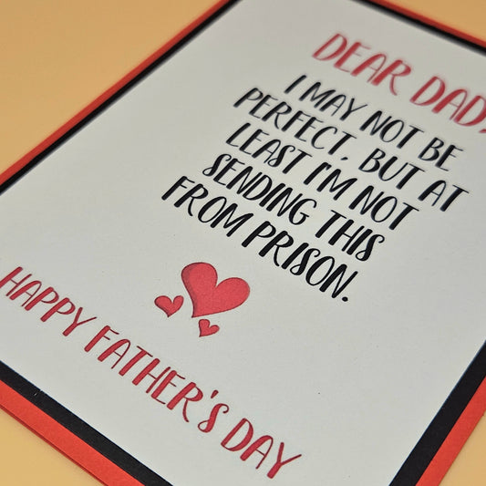 Father's Day card with humorous message and hearts on a plain background