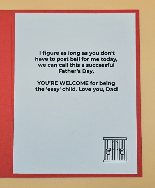 Father's Day card with humorous text and jail cell illustration on a red border.