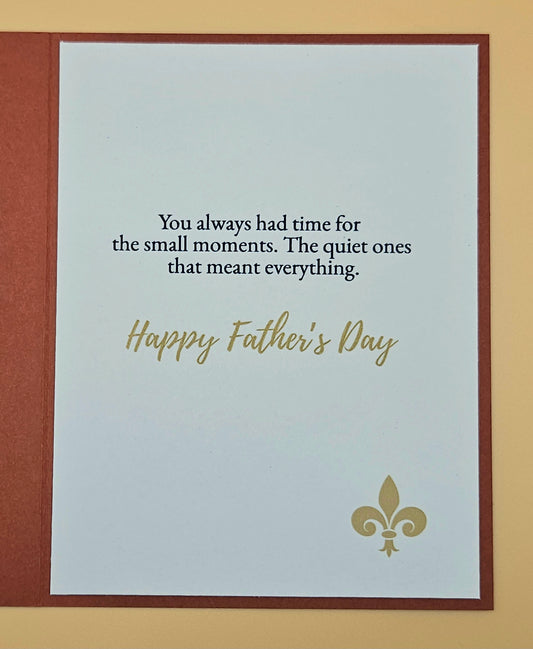 Father's Day card with text and fleur-de-lis design on a beige background