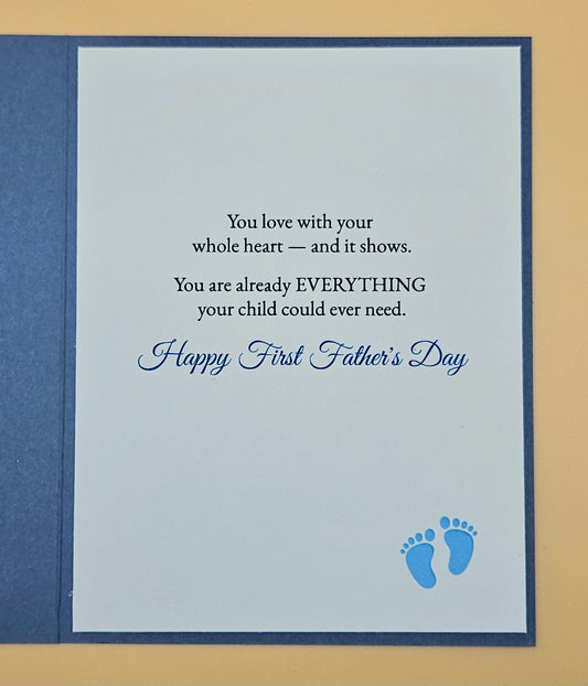 Father's Day card with text and blue footprints on a beige background