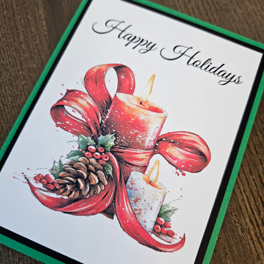 Full Christmas candle and holly card with its coordinating white envelope.
