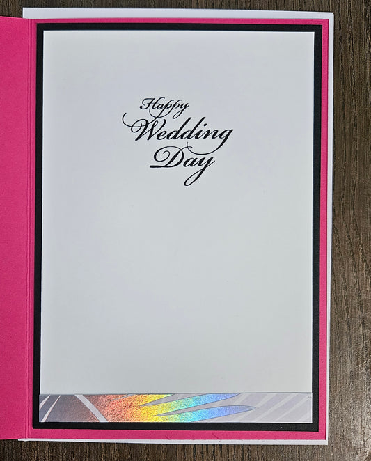 Greeting card with 'Happy Wedding Day' text on a white background with pink border