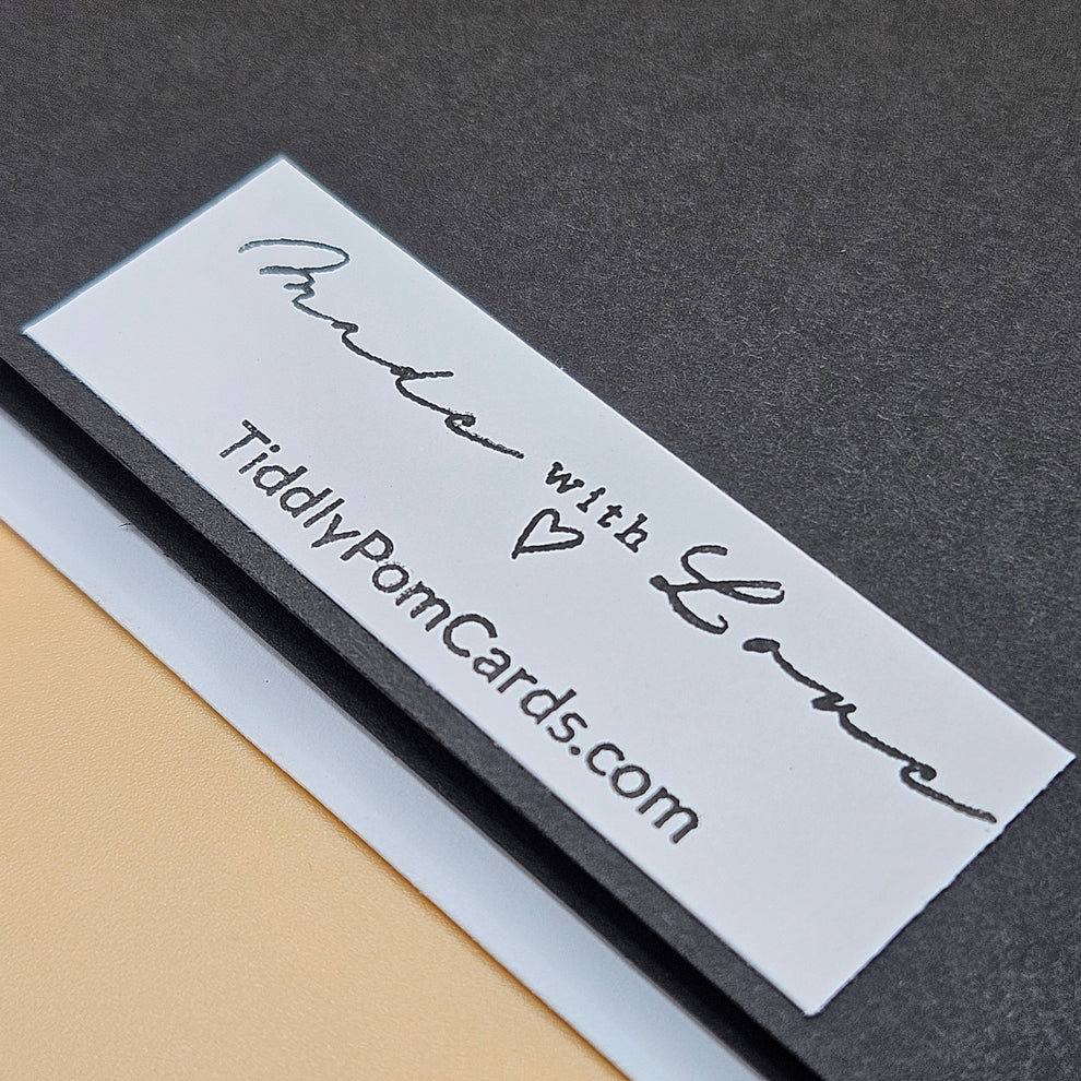 Card with 'Made with Love' text on a gray background