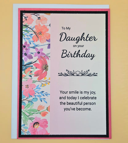 Birthday card for a daughter with floral design and birthday message.