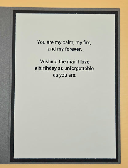Framed text card with romantic message on a plain background
