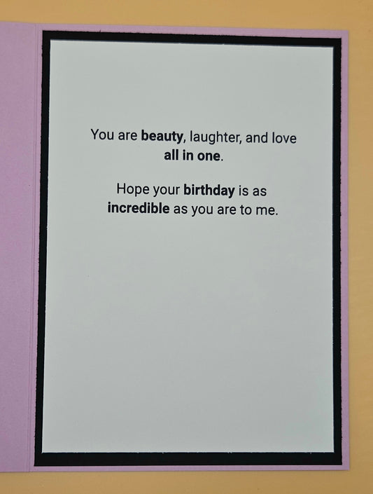Greeting card with a birthday message on a plain background