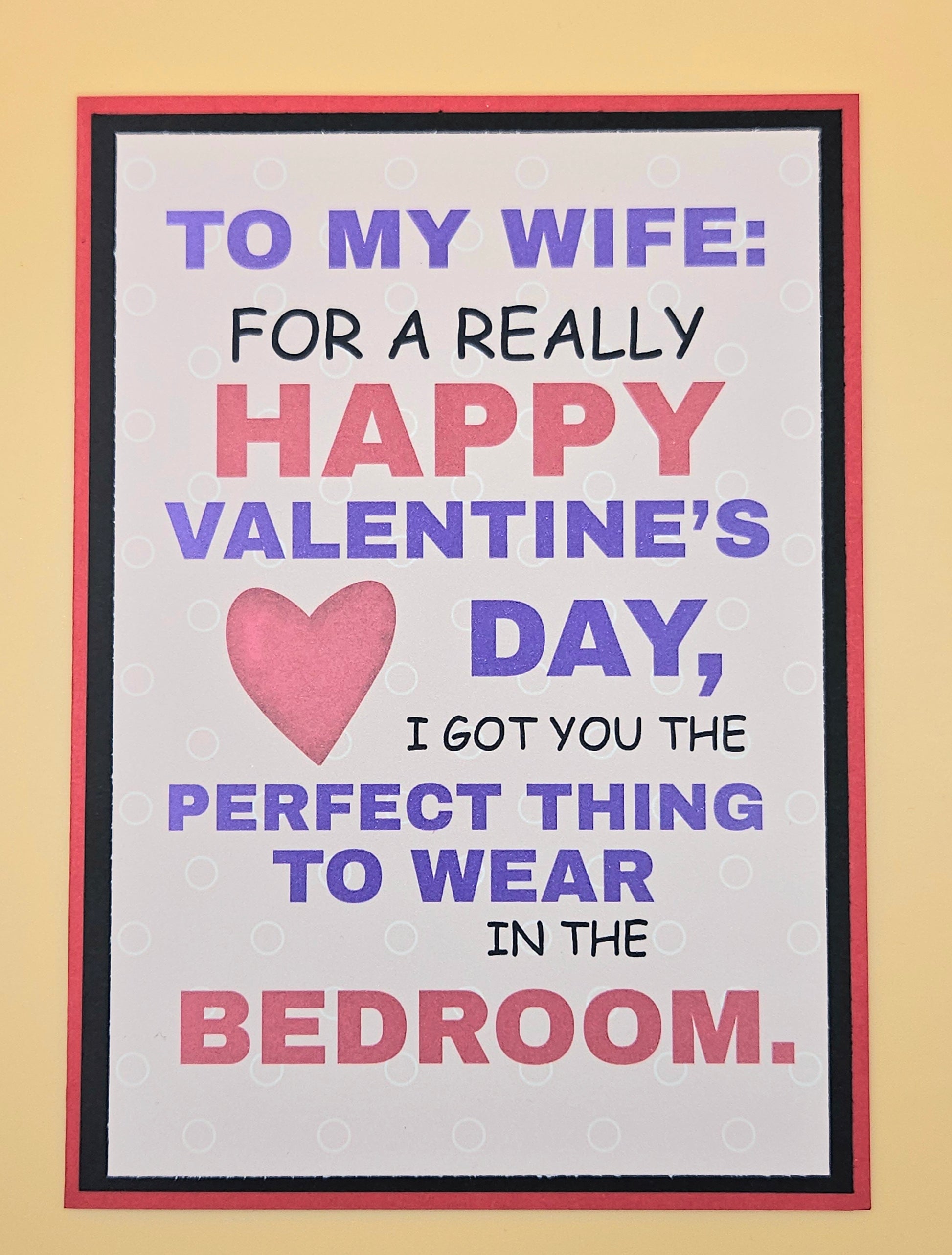 Valentine's Day card with humorous message for wife on a beige background