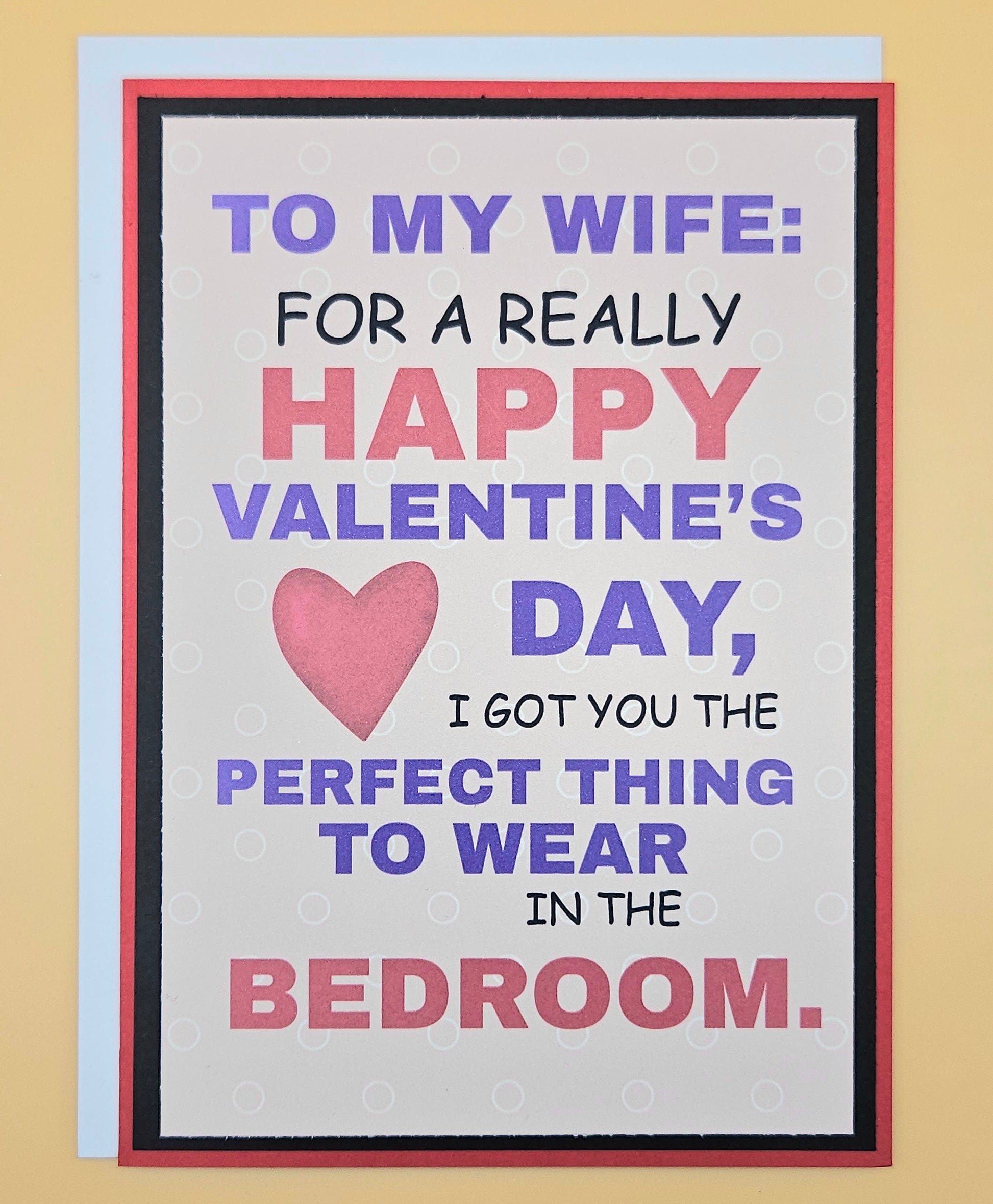 Valentine's Day card for a wife with humorous message and pink heart on beige background