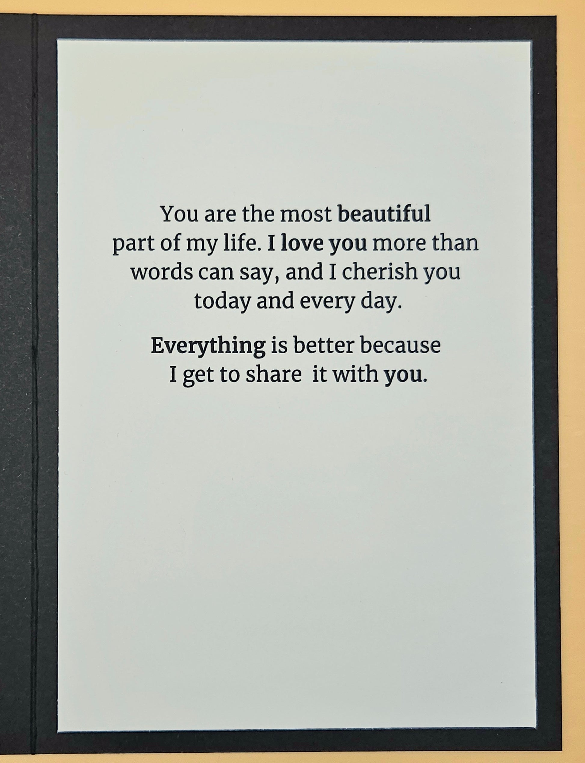 Card with romantic message on a plain background
