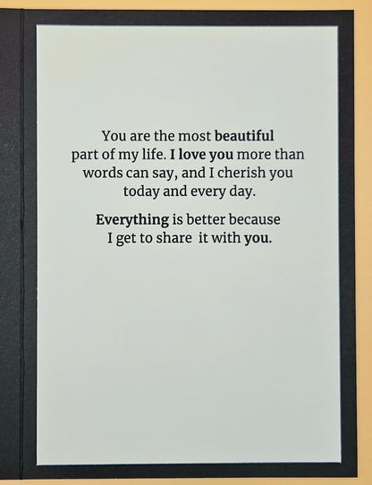 Card with romantic message on a plain background
