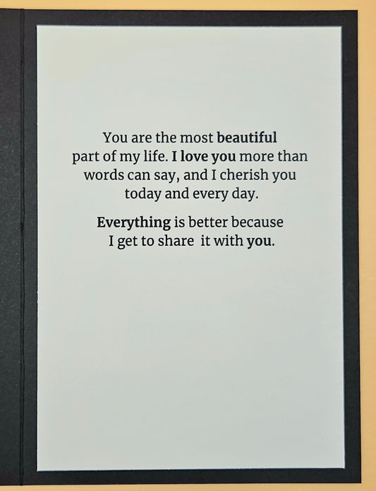 Card with romantic message on a plain background