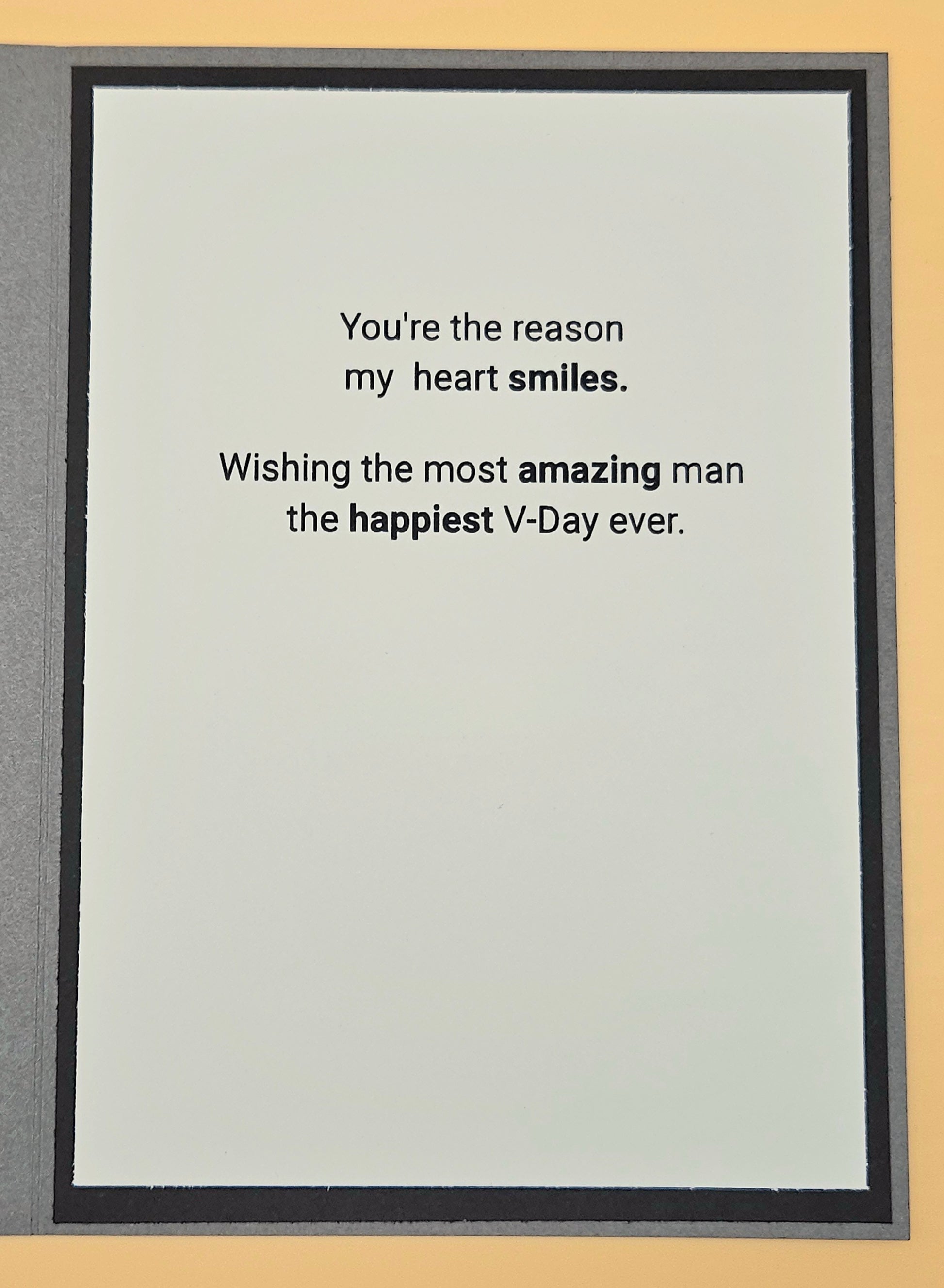 Framed card with Valentine's Day message on a beige background