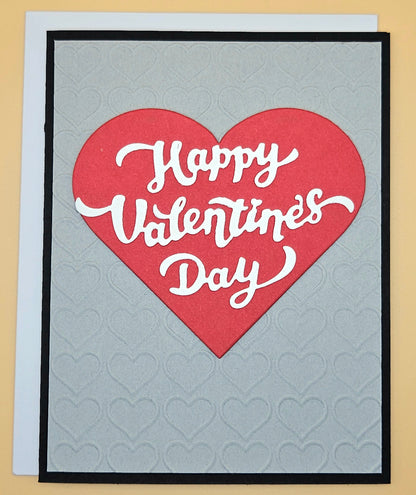 Valentine's Day card with red heart and 'Happy Valentine's Day' text on gray background