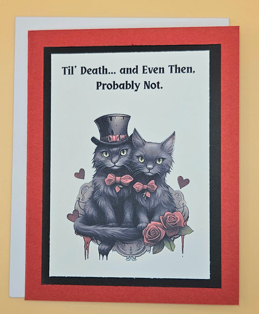 Greeting card with two black cats in top hats and bow ties, surrounded by roses, on a beige background.