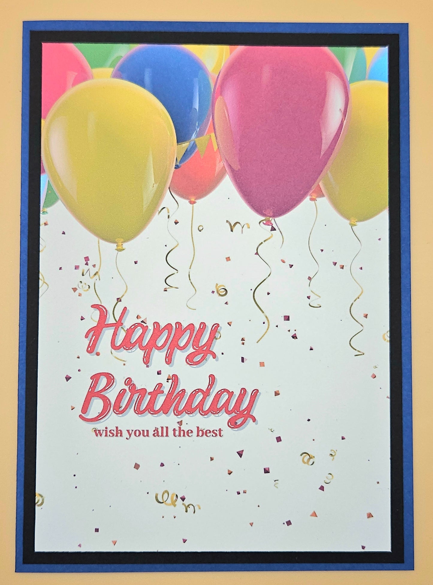 Birthday card with colorful balloons and 'Happy Birthday' text on a beige background