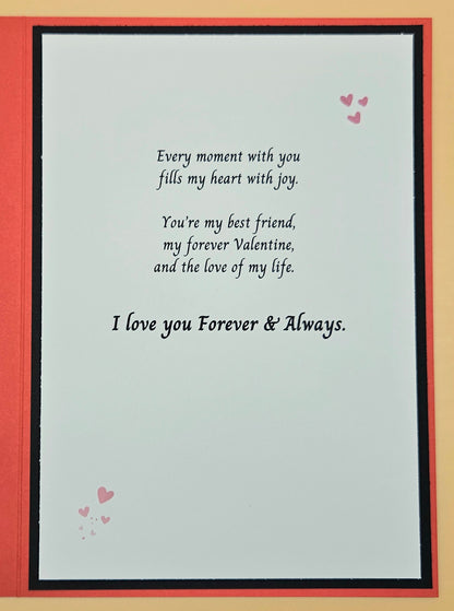 Card with romantic message and hearts on a beige background