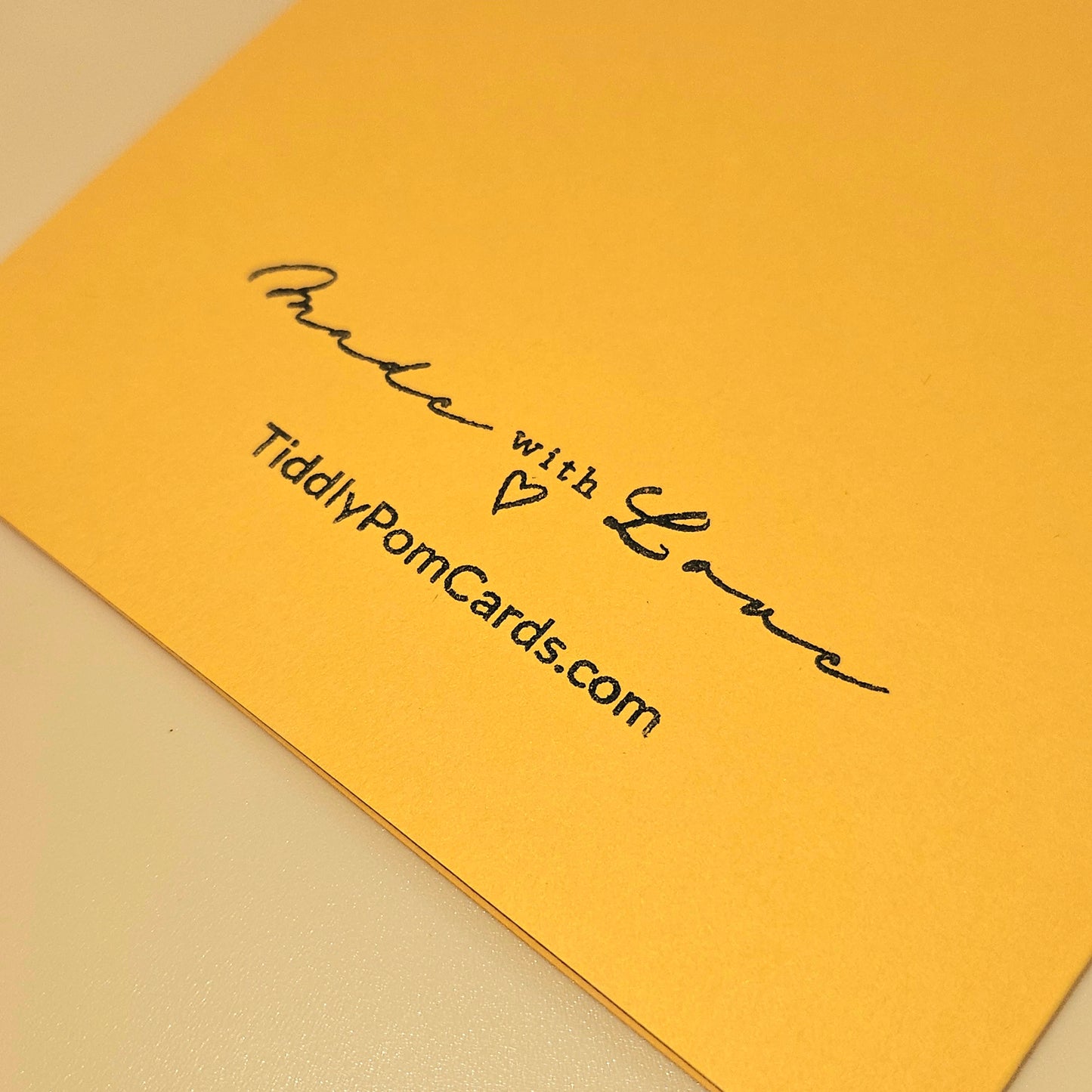 Yellow card with 'Made with Love' and TiddlyPomCards.com text on a beige background