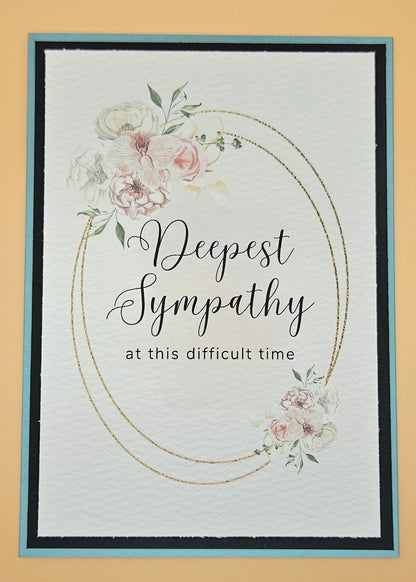 Sympathy card with floral design and 'Deepest Sympathy at this difficult time' text on a beige background