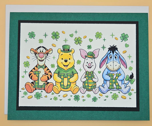 Cartoon characters from 'Winnie the Pooh' with letters spelling 'LUCK' on a green border.