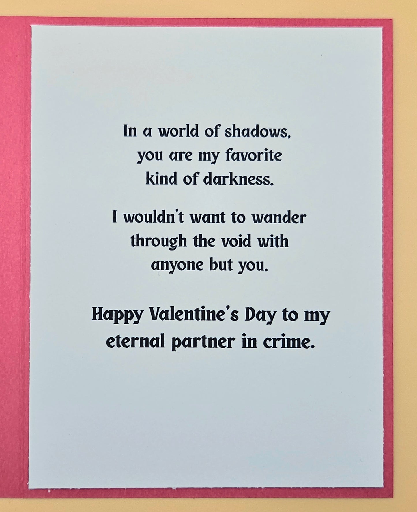 Valentine's Day card with romantic text on a light gray background