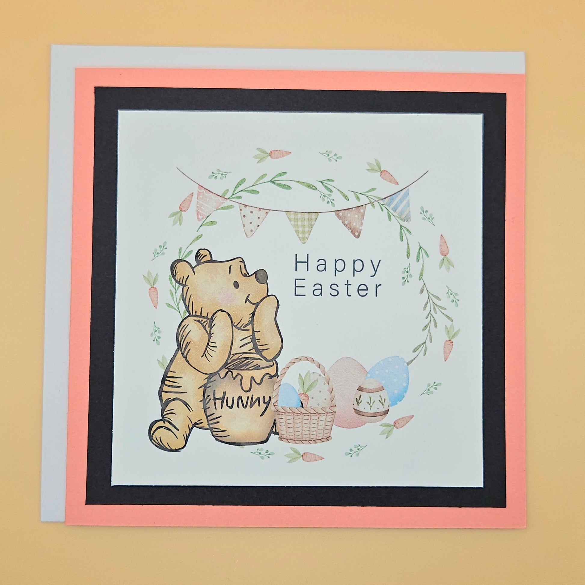 Greeting card with Winnie the Pooh and Easter elements on a beige background