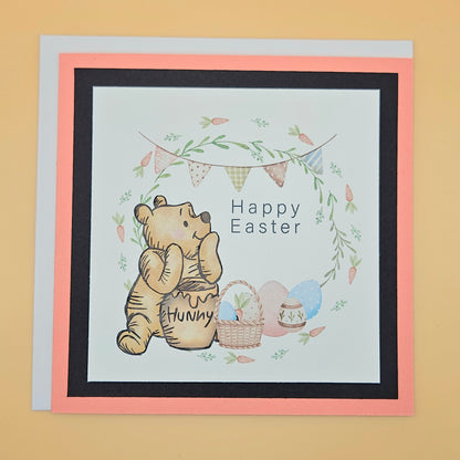 Greeting card with Winnie the Pooh and Easter elements on a beige background