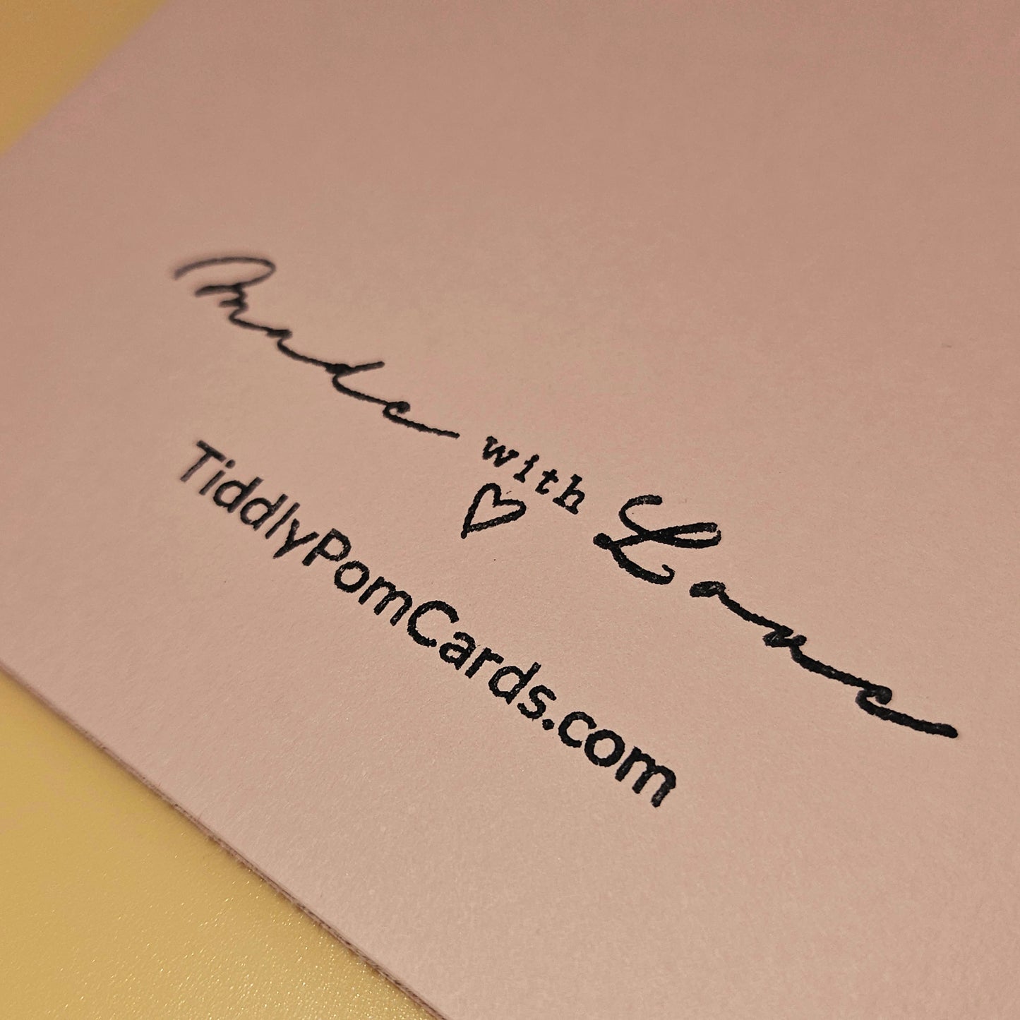 Card with 'Made with Love' text and TiddlyPomCards.com on a pink background