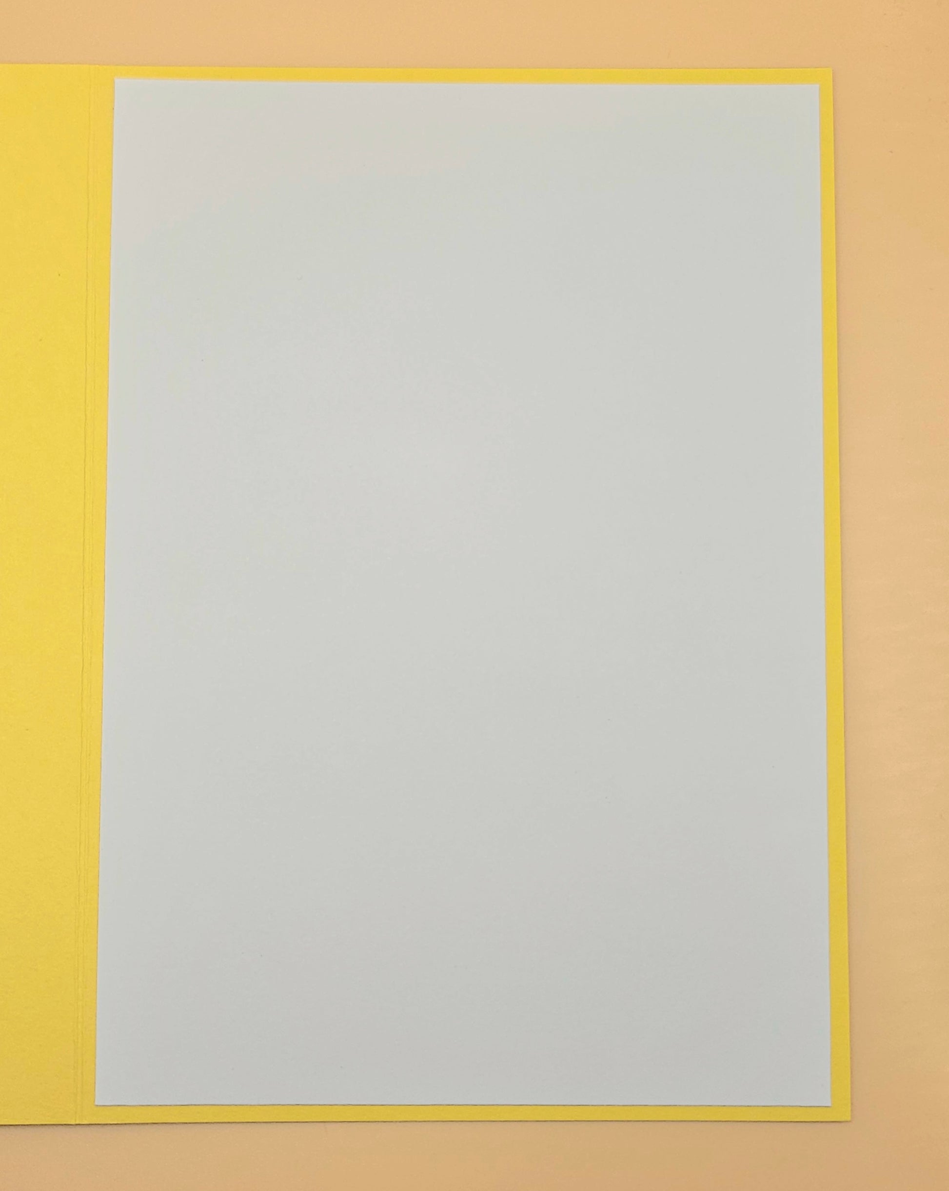 Rectangular frame with a yellow border and a gray center on a beige background