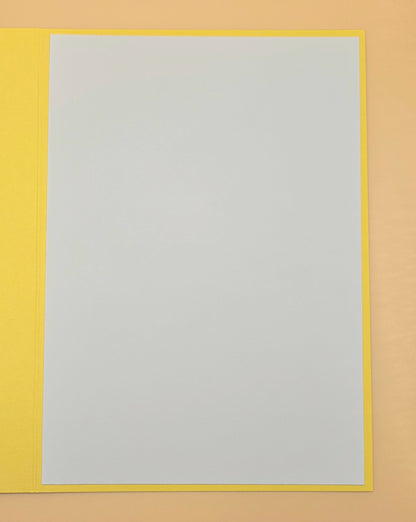 Rectangular frame with a yellow border and a gray center on a beige background