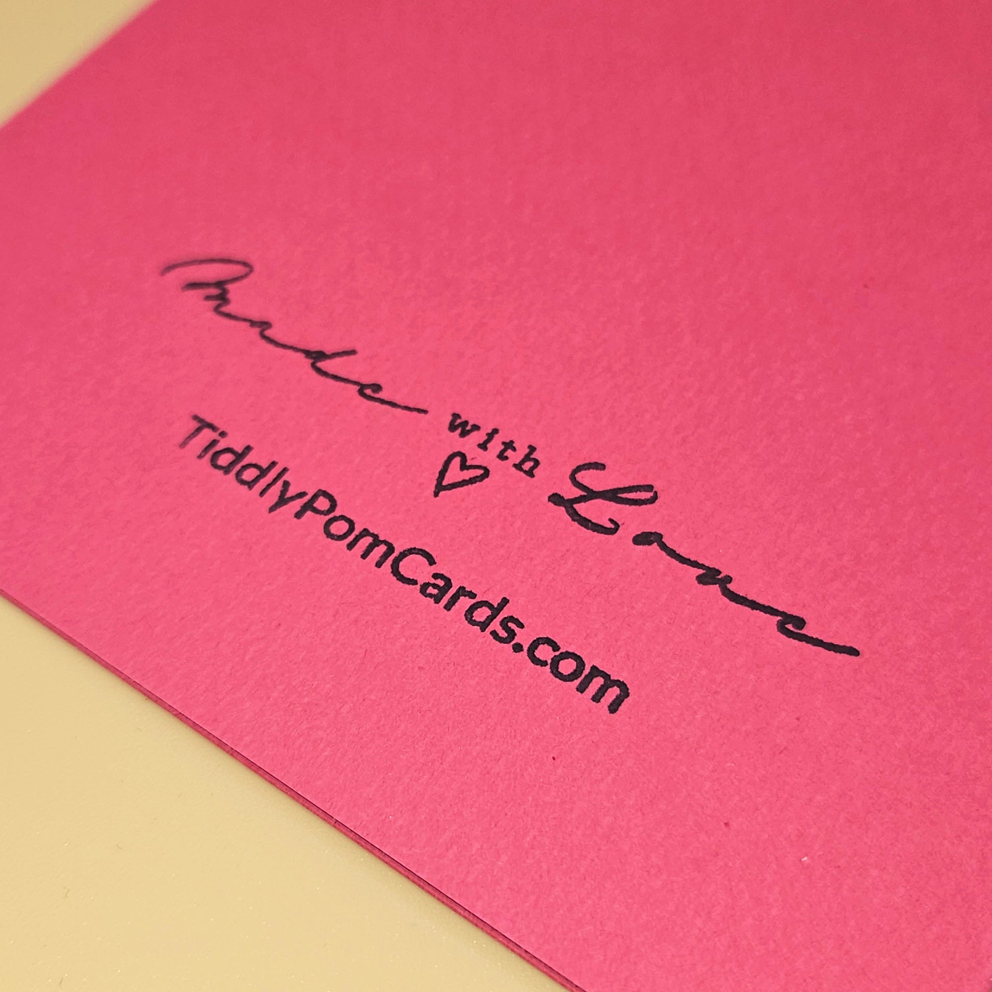 Pink card with 'Made with Love' and 'TiddlyPomCards.com' text on a beige background