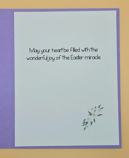 Easter card with text and floral design on a purple border