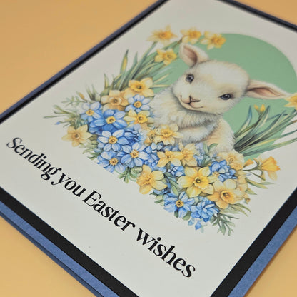 Easter card with a lamb and flowers on a yellow background