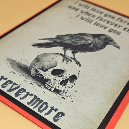 Illustration of a crow on a skull with text 'I will love you forever more' on a textured surface.