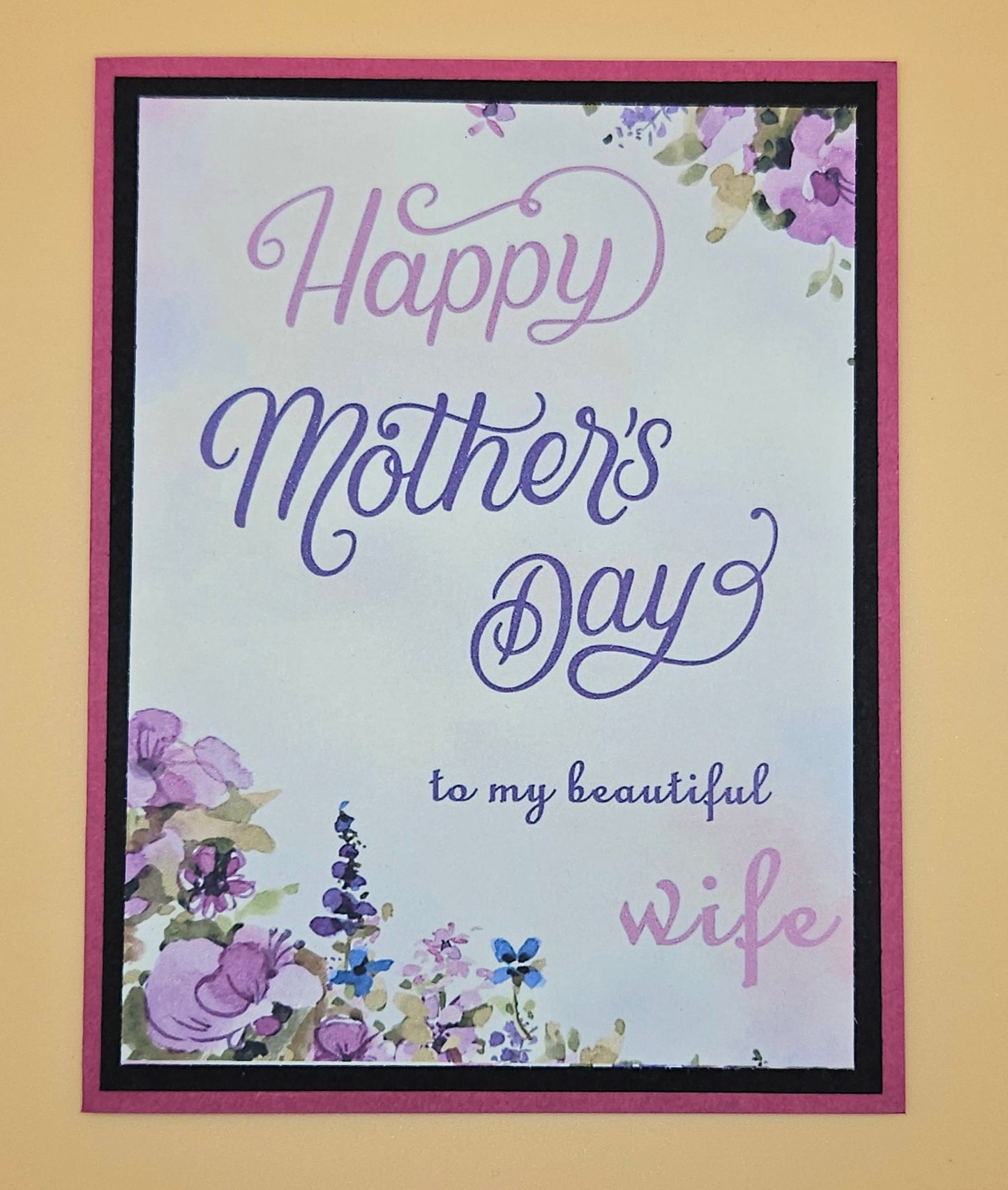 Greeting card with 'Happy Mother's Day to my beautiful wife' text and floral design on a beige background