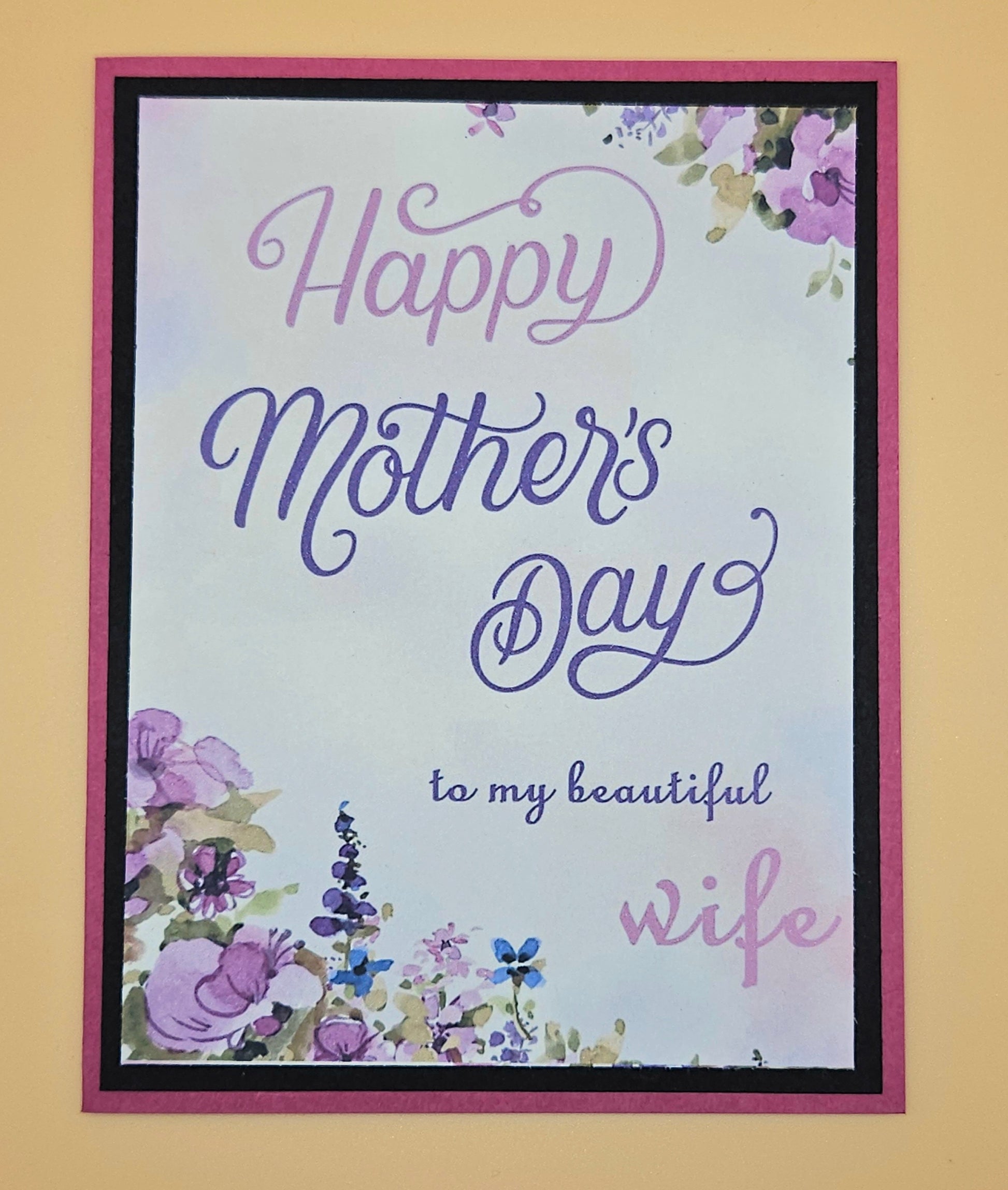 Greeting card with 'Happy Mother's Day to my beautiful wife' text and floral design on a beige background