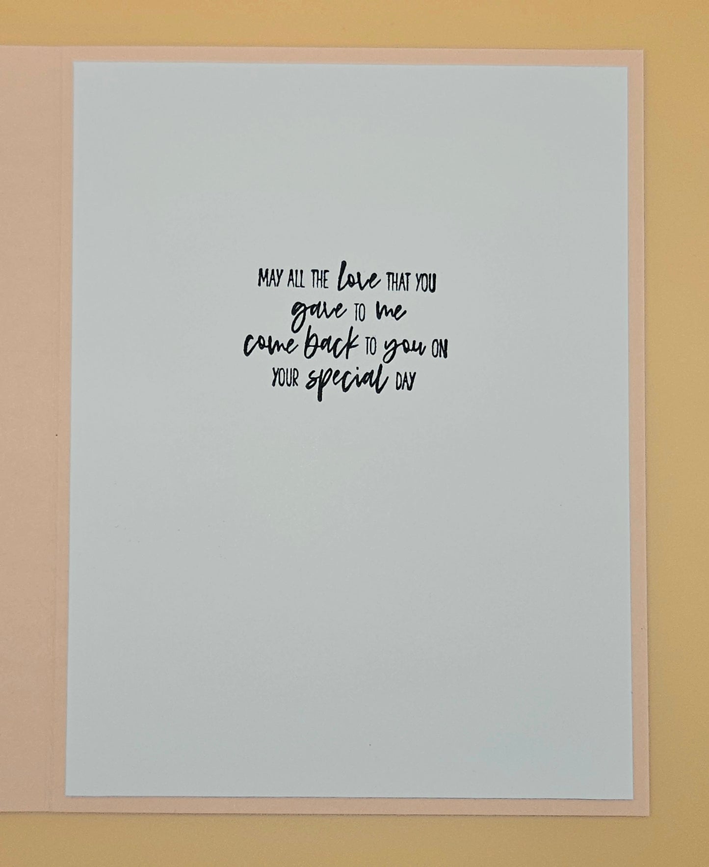 Framed print with a quote on a light gray background