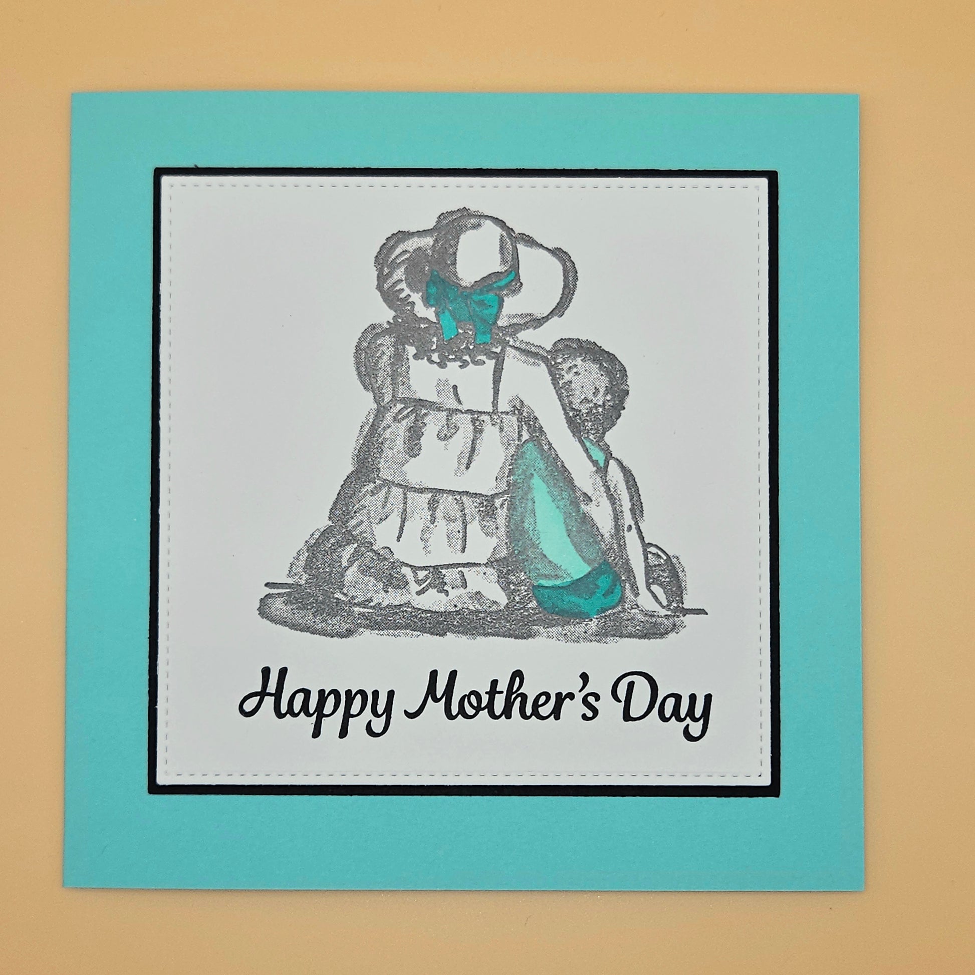 Mother's Day card with illustration of a woman and text on a teal border