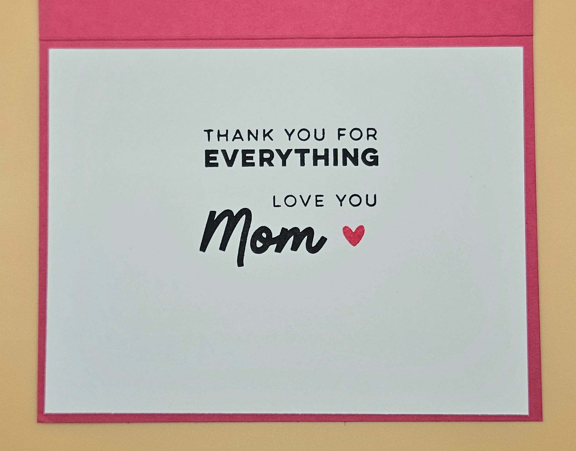 Card with 'Thank you for everything, love you Mom' text on a pink border.