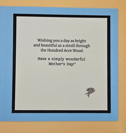 Greeting card with Mother's Day message on a blue border