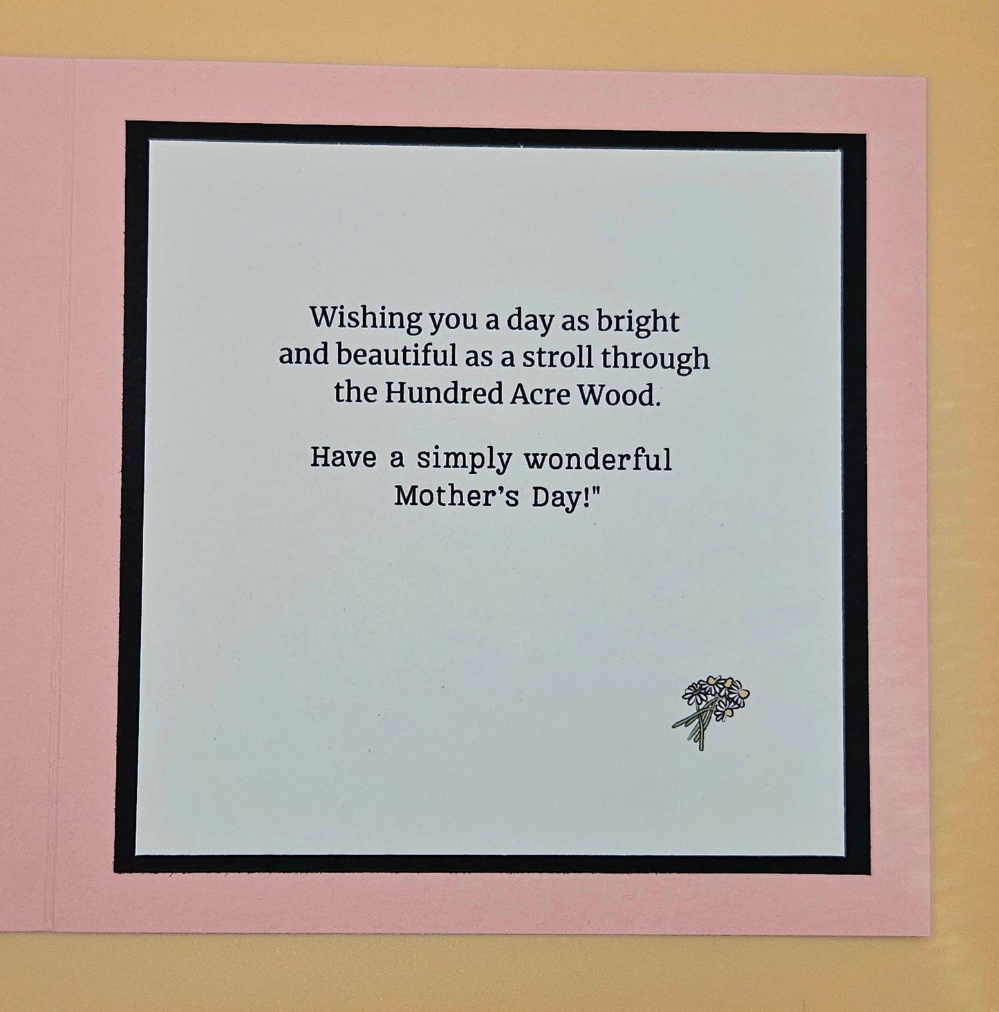 Greeting card with a Mother's Day message on a pink border