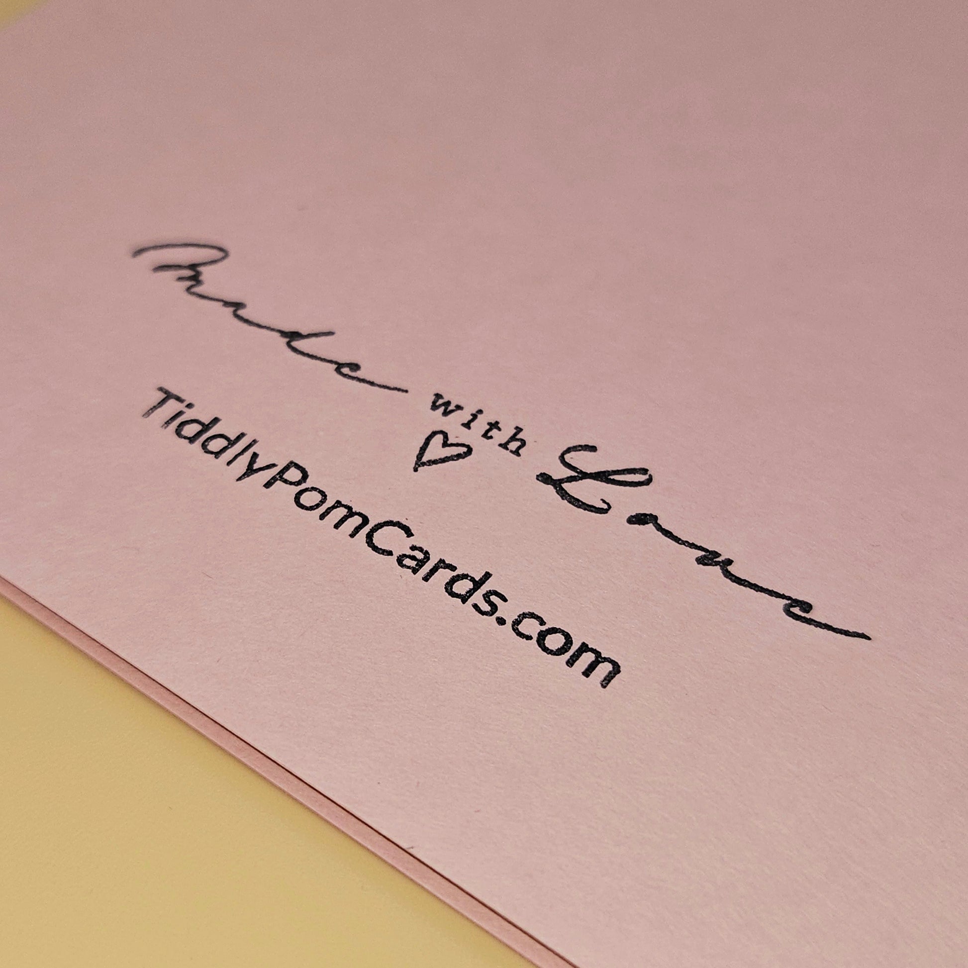 Pink card with 'Made with Love' text and TiddlyPomCards.com on a pink background